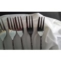 Six vintage chrome plated cake forks
