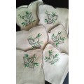 Six stunning vintage embroidered serviettes