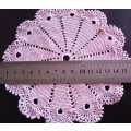 Beautiful vintage crocheted pink doily