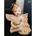 Beautiful  hand painted porcelain Angel with green beach bucket