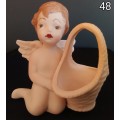 Beautiful hand painted porcelain Angel with basket