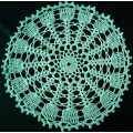 Beautiful green crocheted doily - about 30cms across