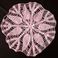 Lovely soft pink crocheted doily - about 31cms across