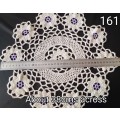 Lovely beige crocheted doily with purple flowers - about 38cms across