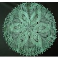 Magnificent detailed green crocheted doily - about 23cms across