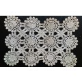 Beautiful detailed beige crocheted doily - about 46cms across