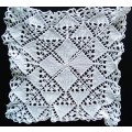 Beautiful white crocheted doily - 22cms across