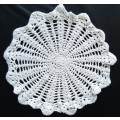 Lovely off-white crocheted doily - 30cms across