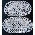 A pair of similar pretty vintage doilies  - 40cms across