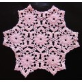 Fine small pink vintage crocheted doily