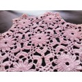 Fine small pink vintage crocheted doily