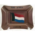 Presumed antique brass ashtray with the fourcolour flag