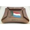 Presumed antique brass ashtray with the fourcolour flag