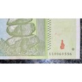 ZIMBABWE 10 TRILLION DOLLARS LOW NUMBER AA0060556 AUNC HARARE 2008 ZIM BIRD WTM