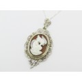 buds.vintage A Gorgeous Filigree Carved Cameo Pendant on Chain in Sterling Silver.