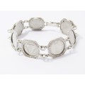 A Lovely Tickey Bracelet In Sterling Silver.