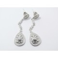 An Elegant pair of Zirconia Dangling  Drop Earrings in Sterling Silver.
