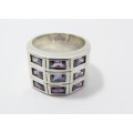 A Gorgeous Broad Purple Zirconia Ring in Sterling Silver.