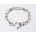 A Lovely Weighty Bracelet Made up in Circles With a Fob Clasp in Sterling Silver.