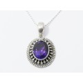 A Gorgeous Oval Amethyst Pendant On Chain in Sterling Silver.