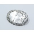 A Gorgeous Art Nouveau Style Brooch Depicting The Sun, The Moon and The Stars  in Sterling Silver.