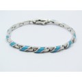 Paneled Bracelet With a Turquoise Inlay in Sterling Silver