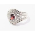 Lovely Broad Engagement Design Ring With a Red Zirconia in Sterling Silver