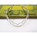 A Gorgeous Broad Cuff Bangle in Sterling Silver.
