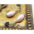 Amazing Freshwater Pearl Drop Earrings With a Flower Detail in Sterling Silver