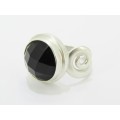 A Lovely Black Stone Ring in Sterling Silver.