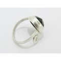 A Lovely Black Stone Ring in Sterling Silver.