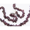.A Beautiful  String Of tumbled garnet necklace With a Sterling Silver Clasp