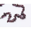 .A Beautiful  String Of tumbled garnet necklace With a Sterling Silver Clasp