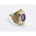A Lovely Three Tone Amethyst Ring in Sterling Silver.
