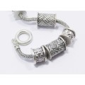 A Gorgeous Weighty Bracelet With Chunky  Slider Charms in Sterling Silver