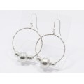 A Lovely Pair of Large Hoop Earrings With Ball Detail in Sterling Silver.