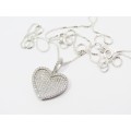 A Stunning Heart Pendant Encrusted With Zirconias on Chain in Sterling Silver.