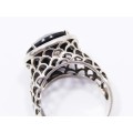 A Gorgeous Facetted Solitaire Design Obsidian Stone Ring in Sterling Silver.