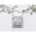 A Lovely Square Zirconia Pendant On Chain in Sterling Silver.