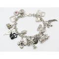 A Gorgeous Weighty Charm Bracelet In Sterling Silver