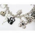 A Gorgeous Weighty Charm Bracelet In Sterling Silver