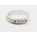 A Gorgeous Multi Color Zirconia Band in Sterling Silver.