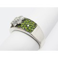 A Stunning Flower Design  Ring Encrusted With Garnets And Peridots in Sterling Silver