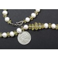A Gorgeous String Of Fresh Water Pearls And Citrine Gemstones With a Sterling Silver Clasp