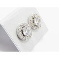 A Lovely Pair of Halo Design Zirconia Stud Earrings in Sterling Silver