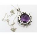 A Stunning Large Purple Zirconia Pendant With Marcasite`s on Chain in Sterling Silver.