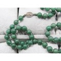 A Gorgeous String Of Adventurine Beads With a Oriental Vintage Clasp in Sterling Silver
