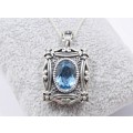 A Spectacular Blue Zirconia  Pendant On Chain in Sterling Silver.
