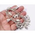 A Gorgeous Vintage  Chunky Charm Bracelet in Sterling Silver