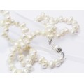 A Gorgeous String of Fresh Water Pearls With a Sterling Silver Clasp